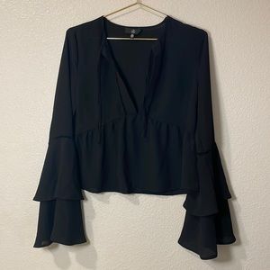 Black bell sleeve top